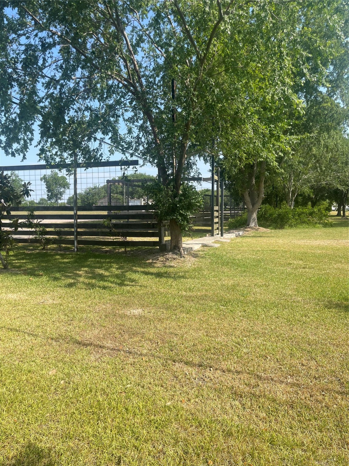 16719 McLean Road Pearland, TX 77584 - Photo 14 of 15 a view of a swimming pool with an outdoor space and seating area