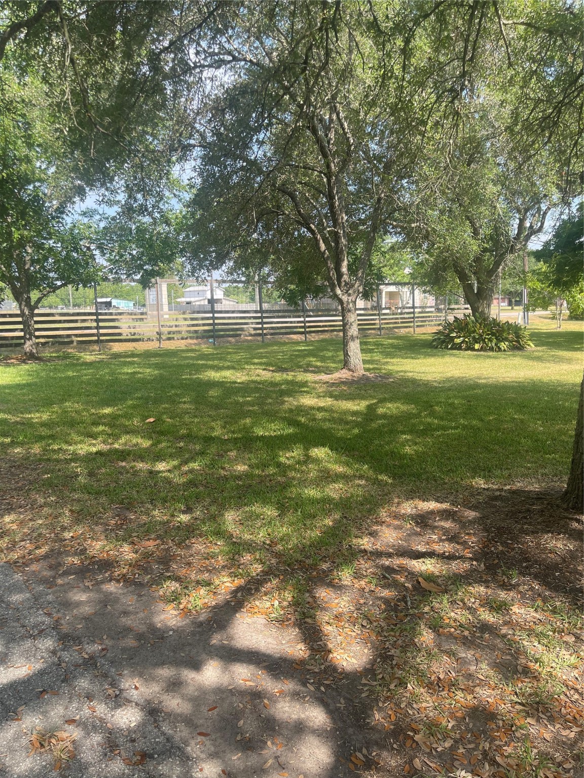 16719 McLean Road Pearland, TX 77584 - Photo 8 of 15 a garden view with a fountain