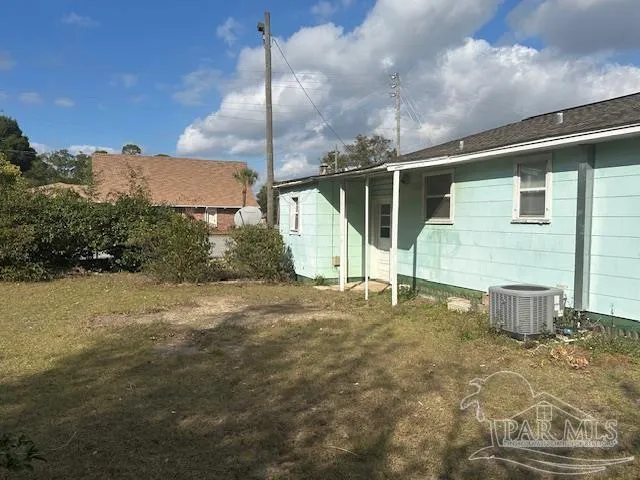 wooden floor in a hall with a window