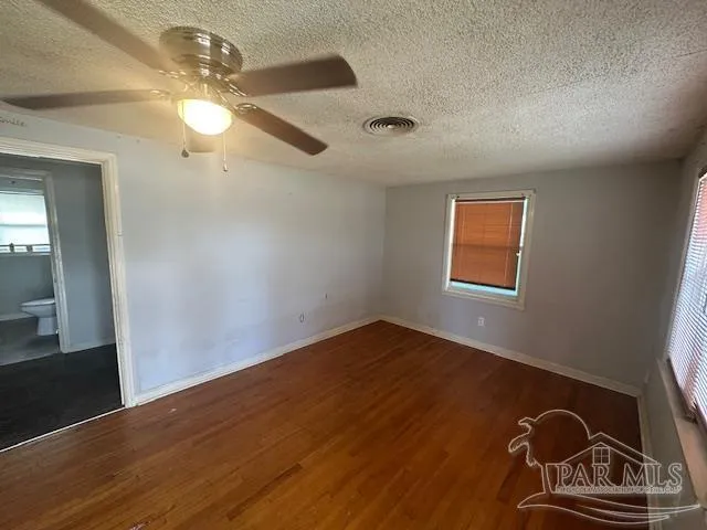 a kitchen with a refrigerator sink and stove