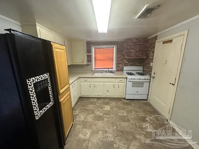 a bathroom with a toilet a sink and bathtub