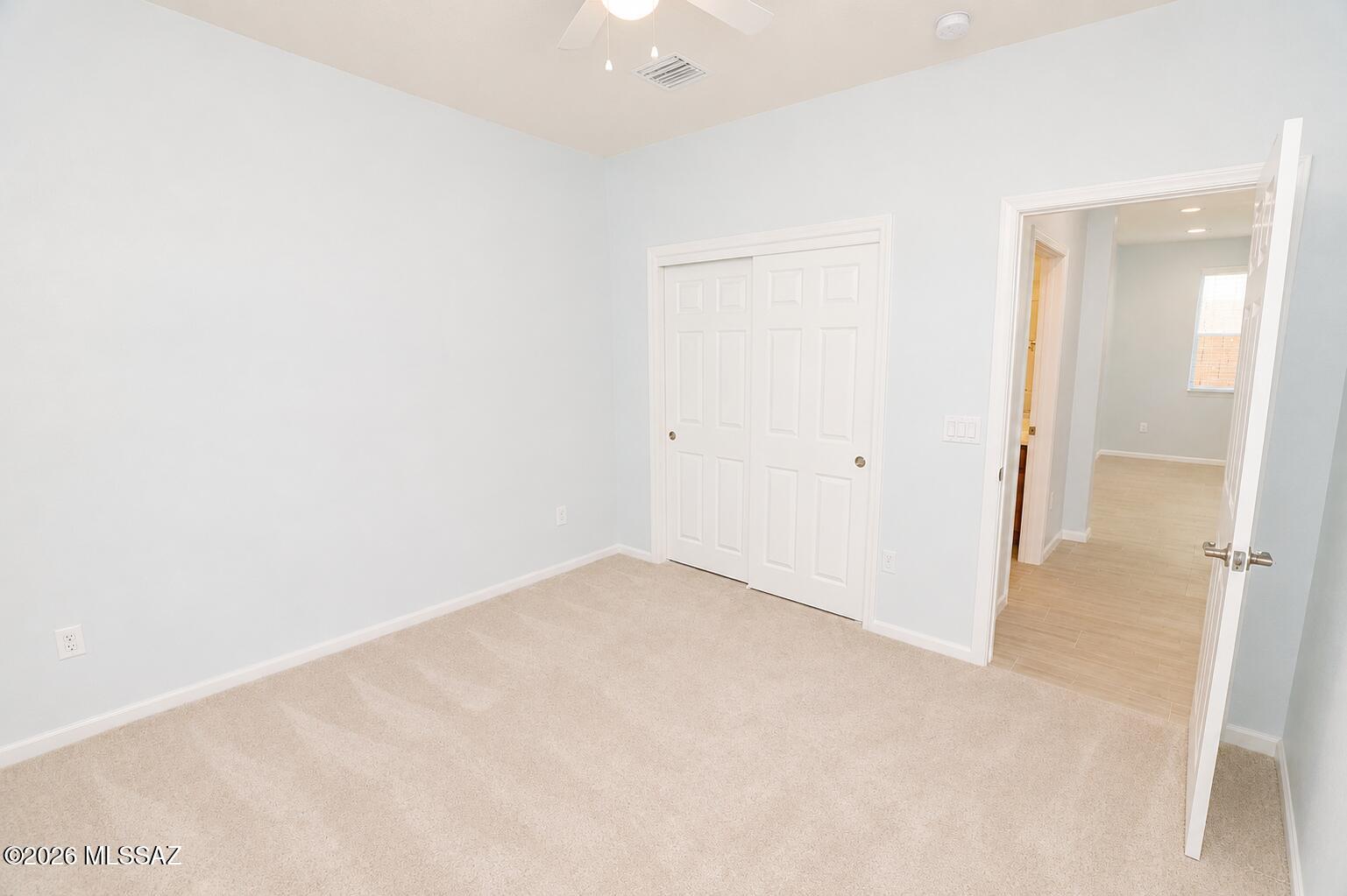 11484 East Desert Raptor Loop Tucson, AZ 85747 - Photo 22 of 28 an empty room with an entryway