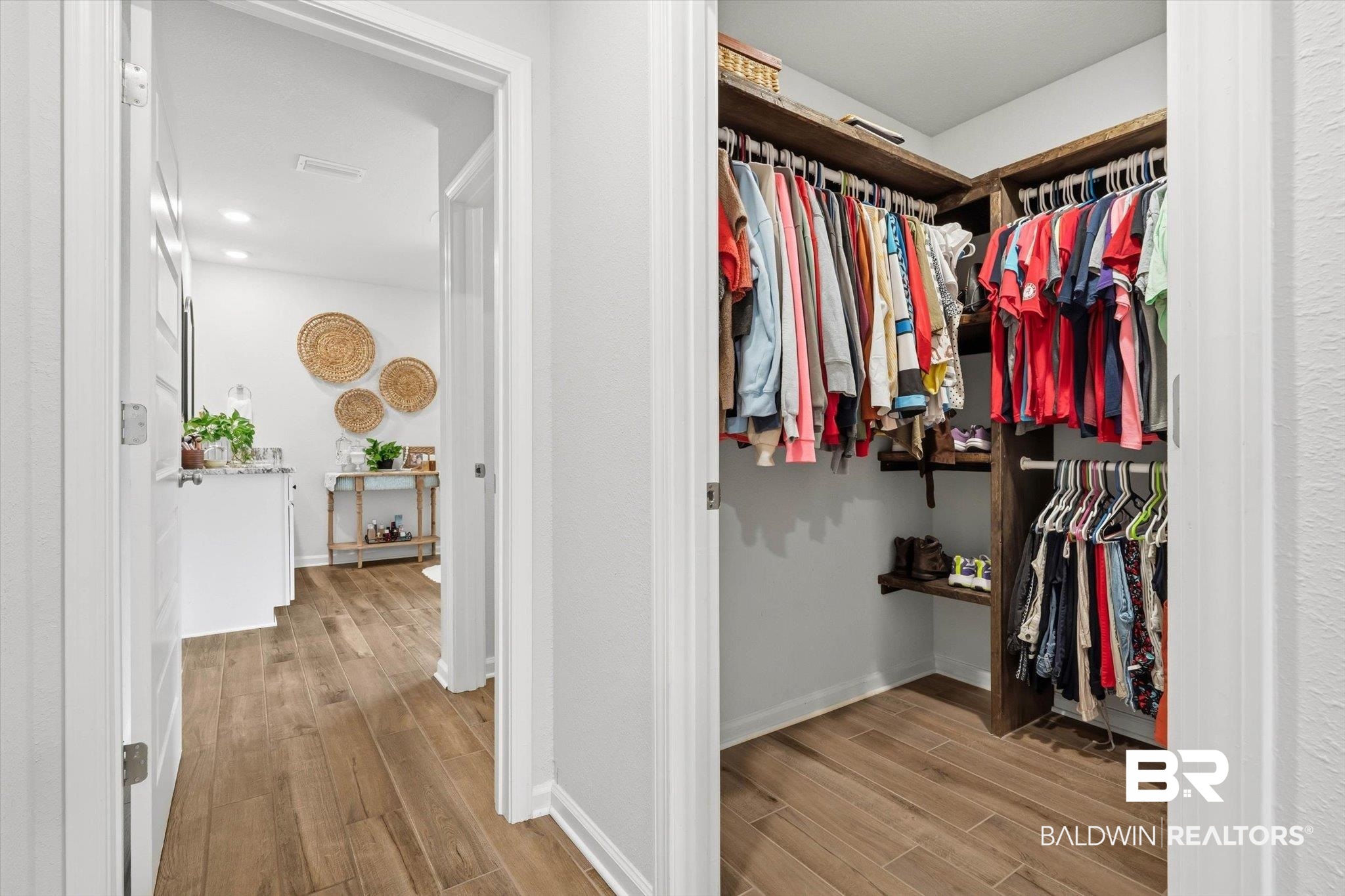 17041 Muse Street Loxley, AL 36551 - Photo 13 of 44 Walk in closet featuring light wood-style floors
