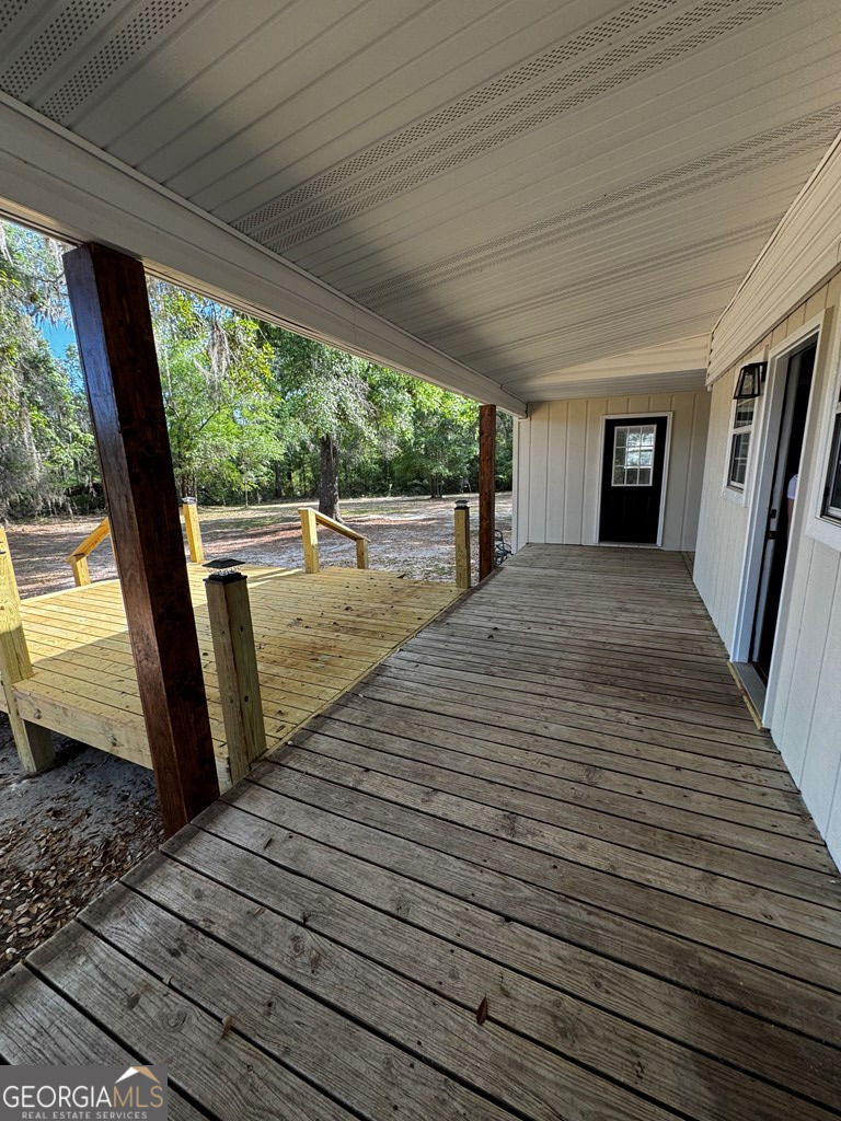5781 Adams Road Valdosta, GA 31601 - Photo 25 of 27 a view of a backyard of the house