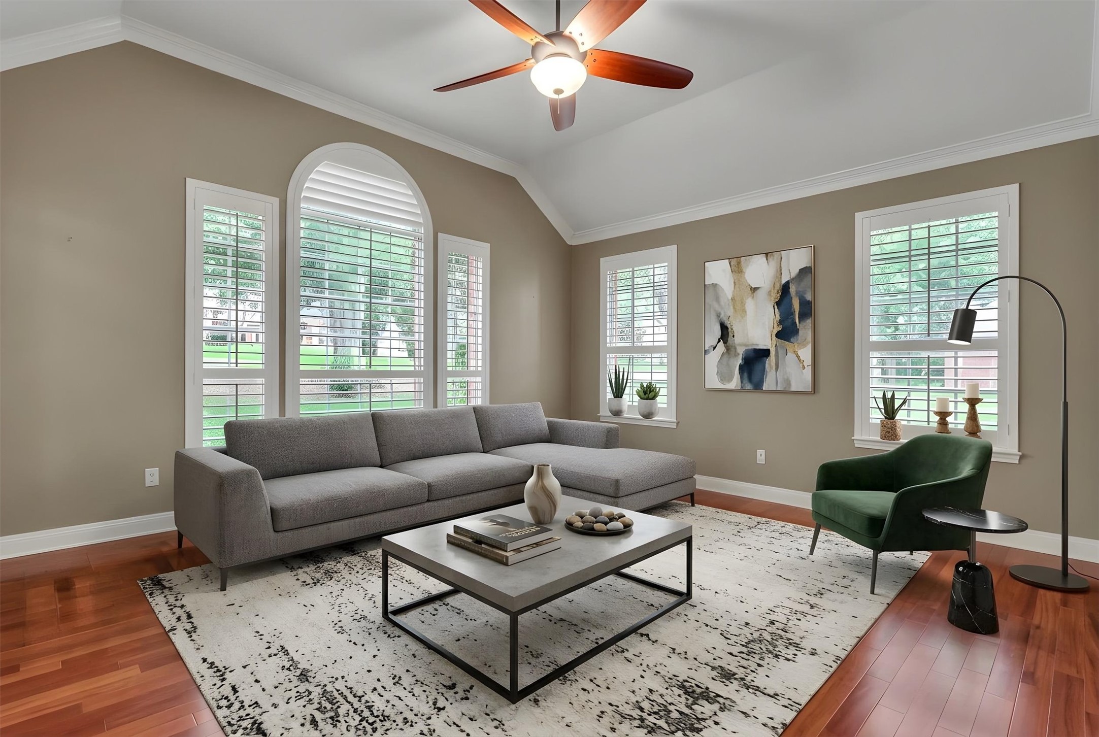 6008 Tributary Ridge Court Austin, TX 78759 - Photo 3 of 36 Virtually staged Sun-filled living space featuring a vaulted ceiling and rich hardwood floors.