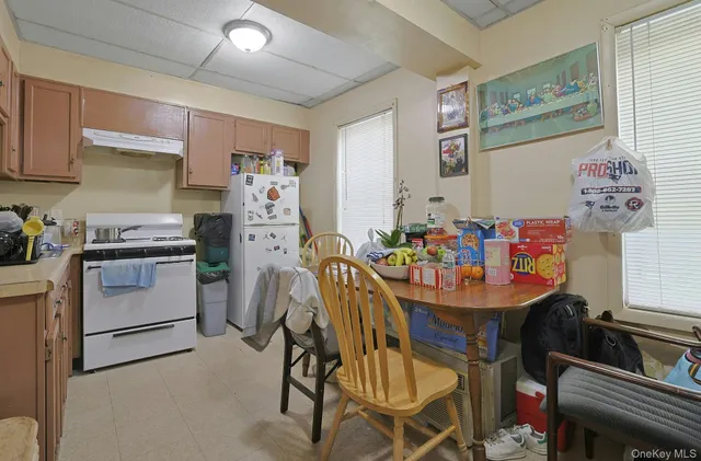 a view of a dining room with furniture