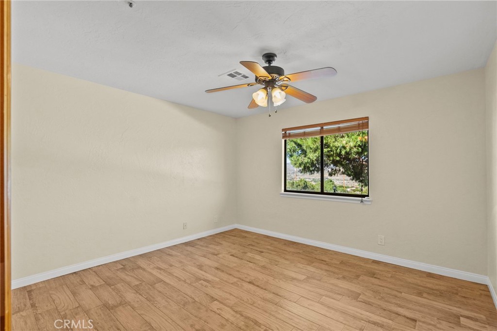 902 Searchlight Ranch Road Acton, CA 93510 - Photo 25 of 52 a view of an empty room with a window