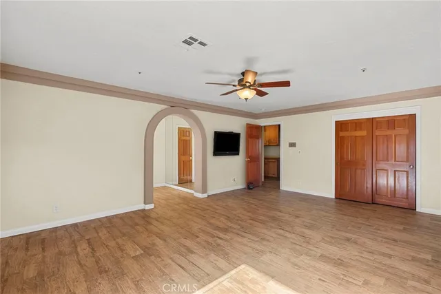 a view of a bathroom with wooden floor