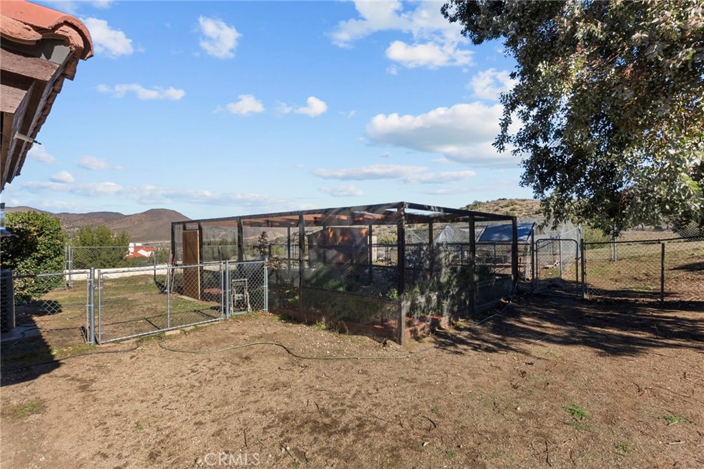 902 Searchlight Ranch Road Acton, CA 93510 - Photo 42 of 52 a view of a house with backyard and sitting area