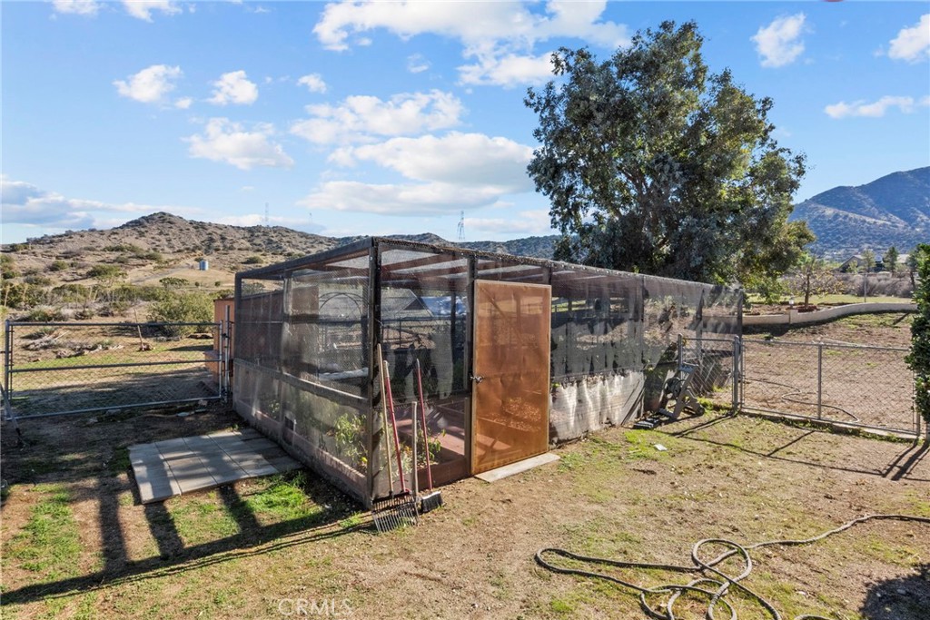 902 Searchlight Ranch Road Acton, CA 93510 - Photo 44 of 52 a view of a backyard with wooden floor and city view