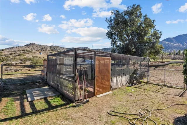 an aerial view of a house with a garden