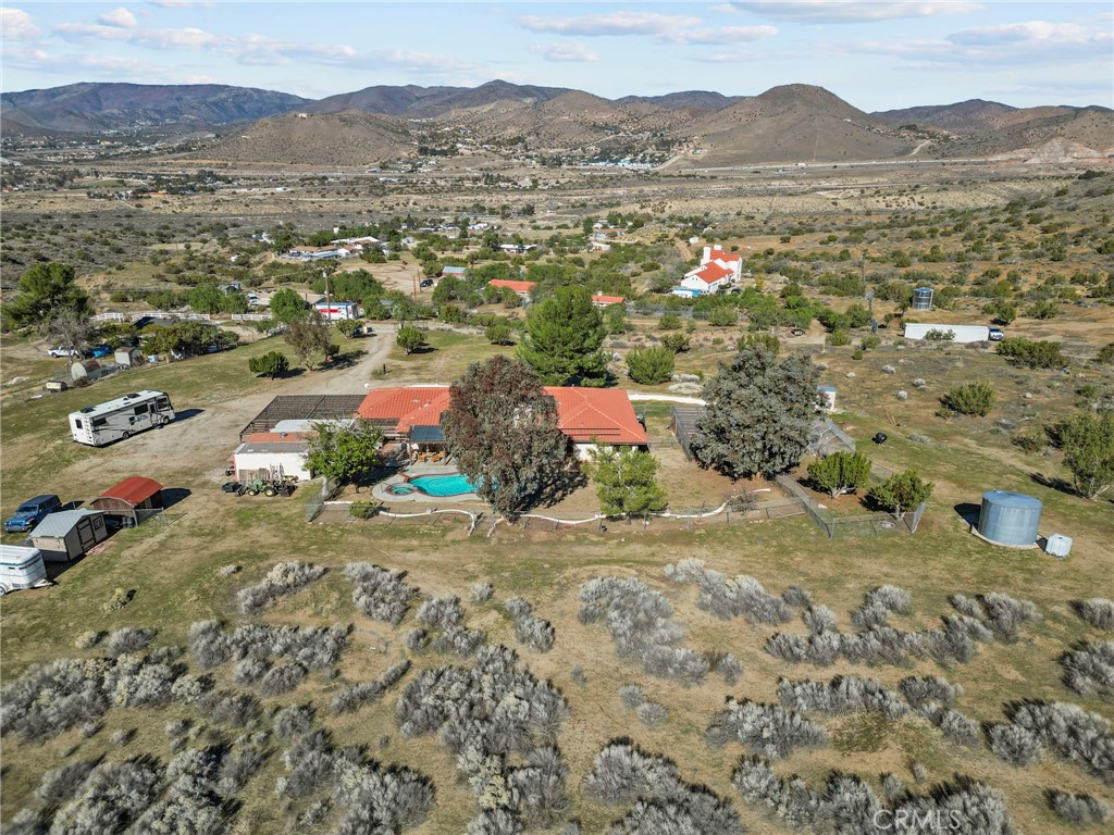 902 Searchlight Ranch Road Acton, CA 93510 - Photo 46 of 52 a view of a town with mountains in the background