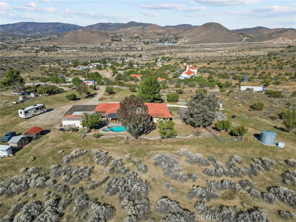 902 Searchlight Ranch Road Acton, CA 93510 - Photo 46 of 52 a view of a town with mountains in the background