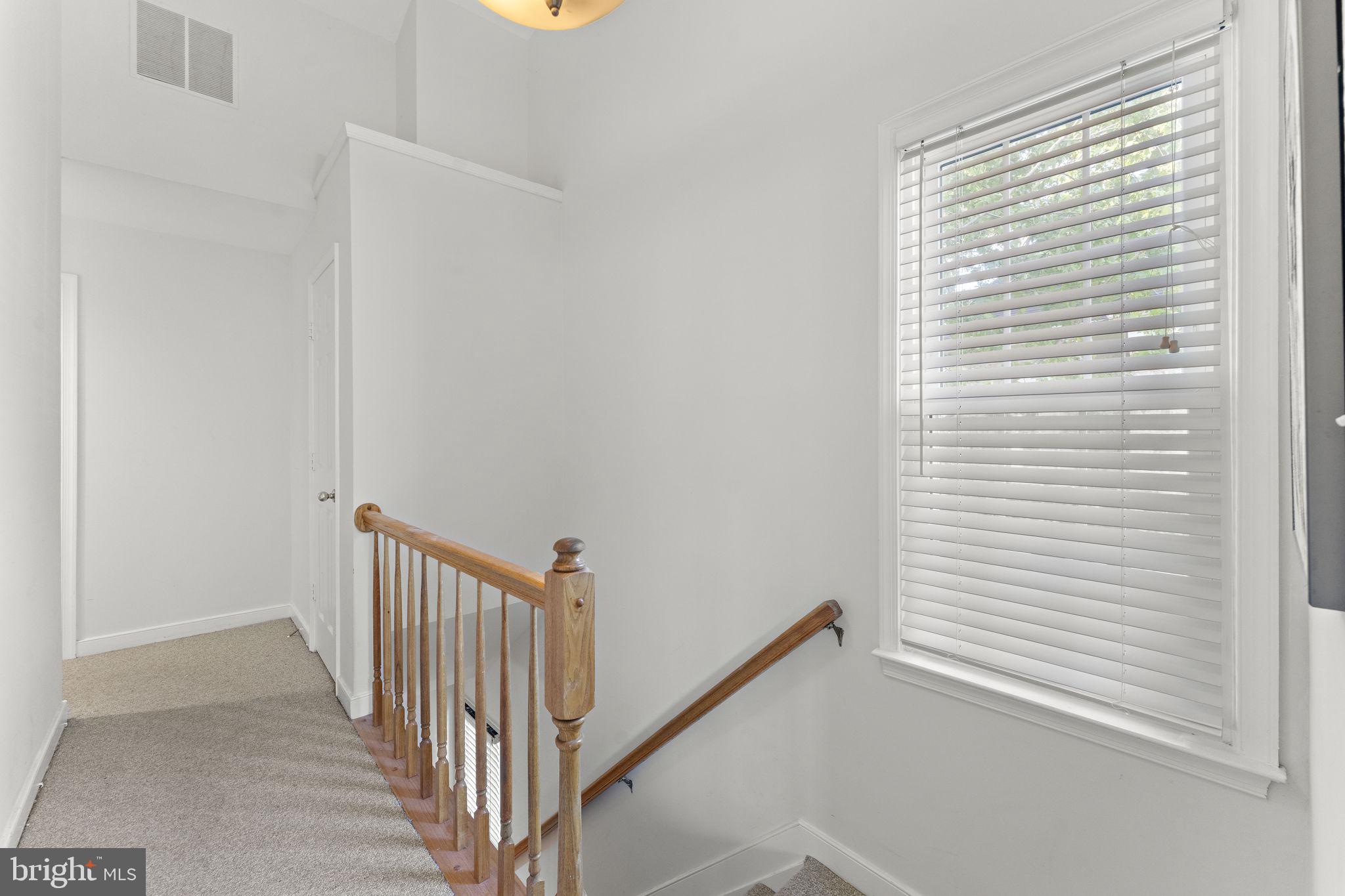 10934 Rocky Mt Way Silver Spring, MD 20902 - Photo 35 of 51 a view of a room with a white door
