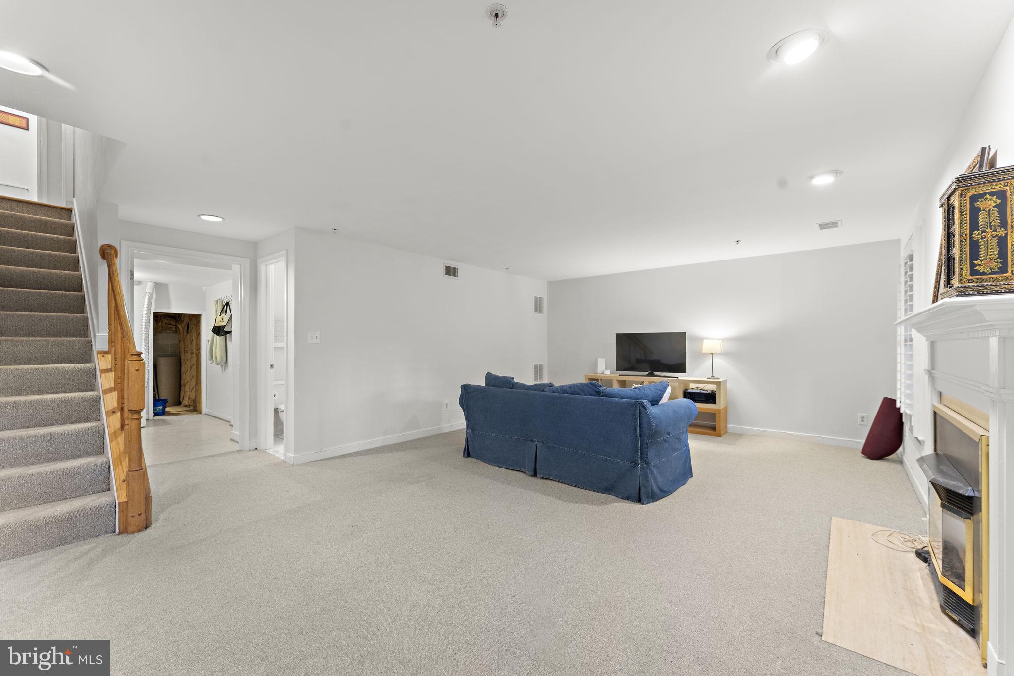 10934 Rocky Mt Way Silver Spring, MD 20902 - Photo 38 of 51 a living room with furniture