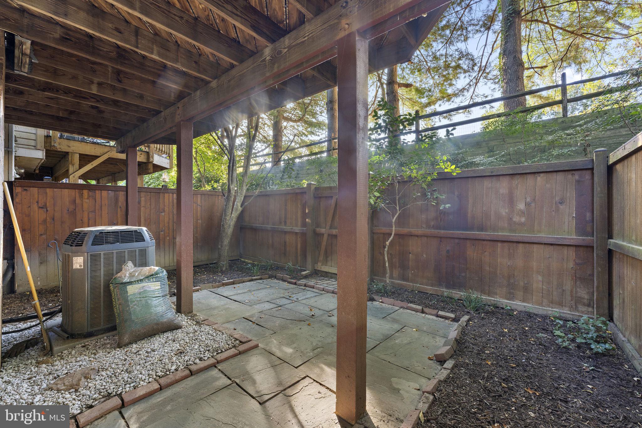 10934 Rocky Mt Way Silver Spring, MD 20902 - Photo 41 of 51 a backyard of a house with seating space