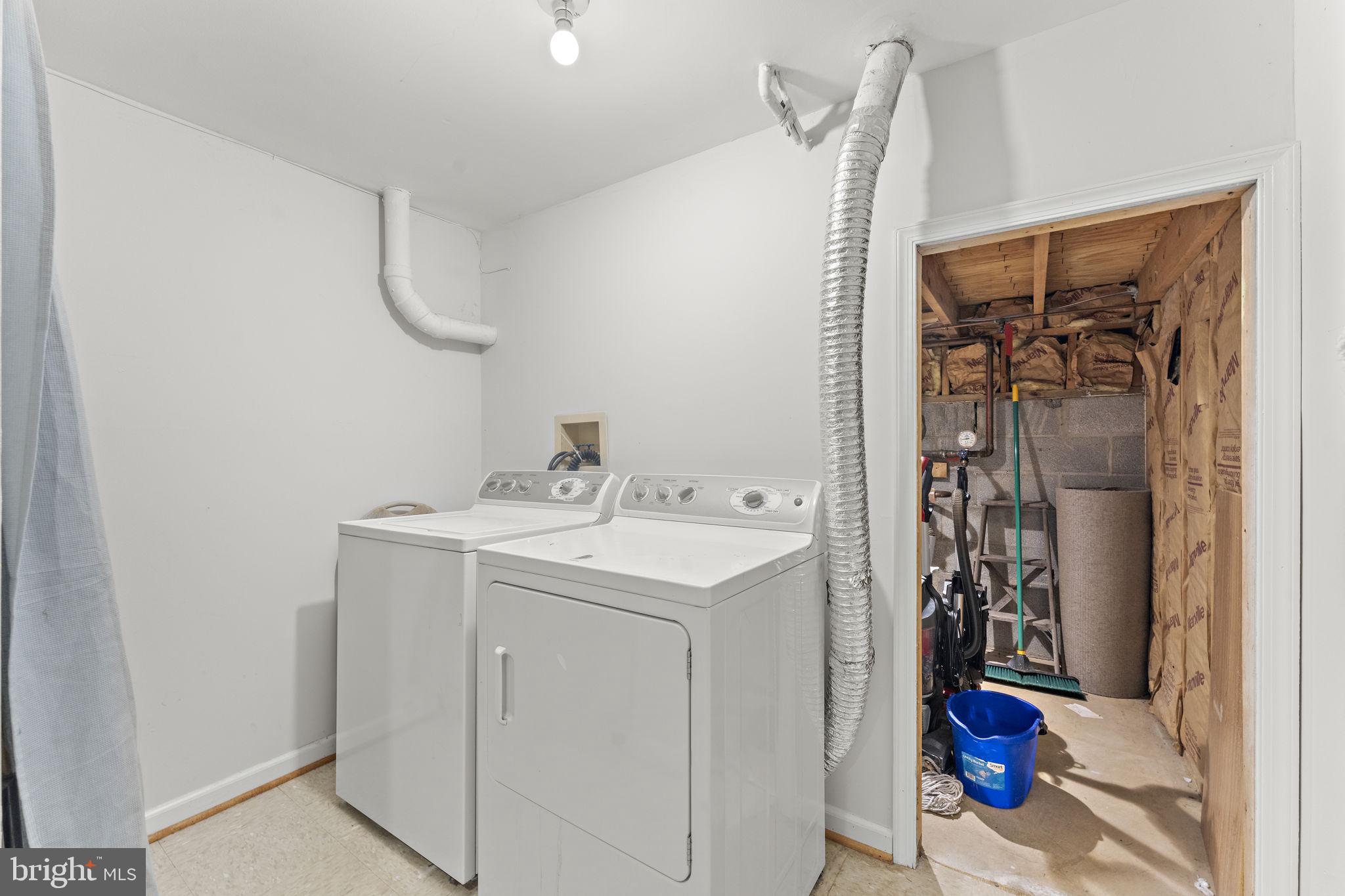 10934 Rocky Mt Way Silver Spring, MD 20902 - Photo 44 of 51 a utility room with dryer and washer