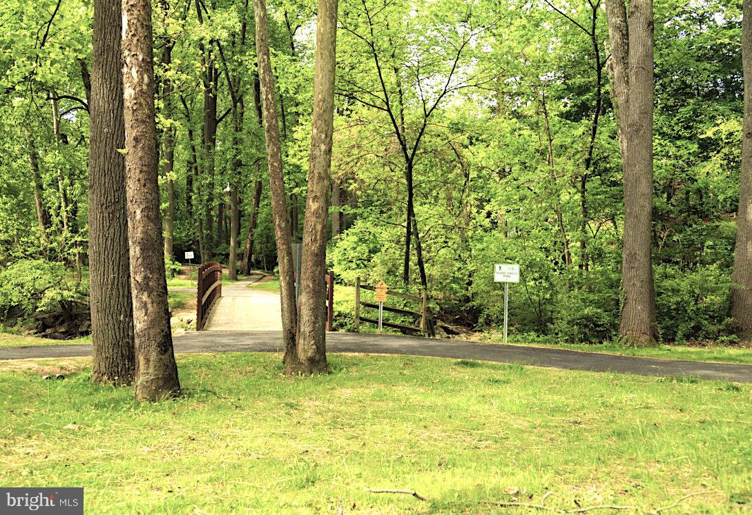 10934 Rocky Mt Way Silver Spring, MD 20902 - Photo 47 of 51 a view of swimming pool with a trees