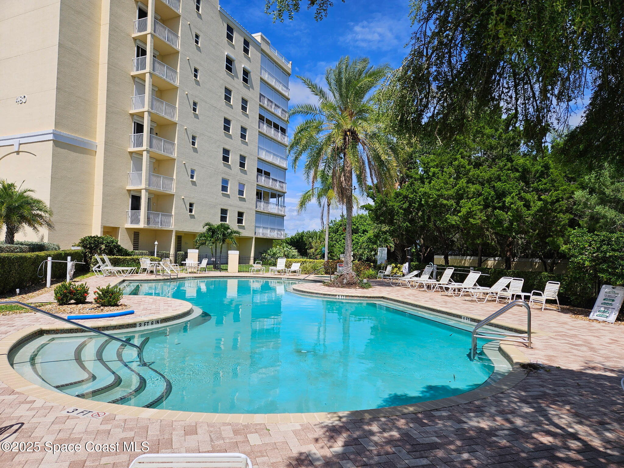 500 Sail Lane, Unit 203 Merritt Island, FL 32953 - Photo 40 of 52 a view of swimming pool with outdoor seating