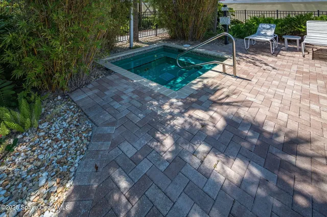 aerial view of a house with a lake view