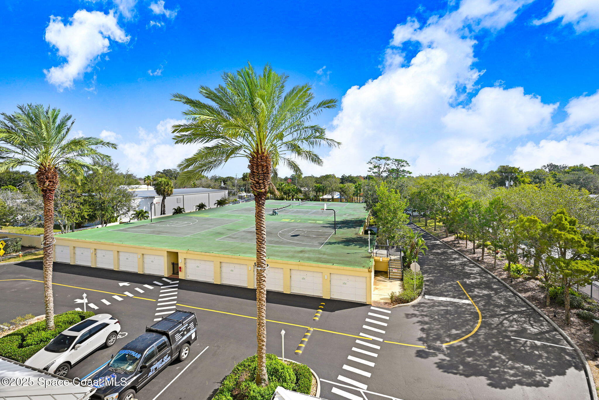 500 Sail Lane, Unit 203 Merritt Island, FL 32953 - Photo 43 of 52 a view of a swimming pool with a patio