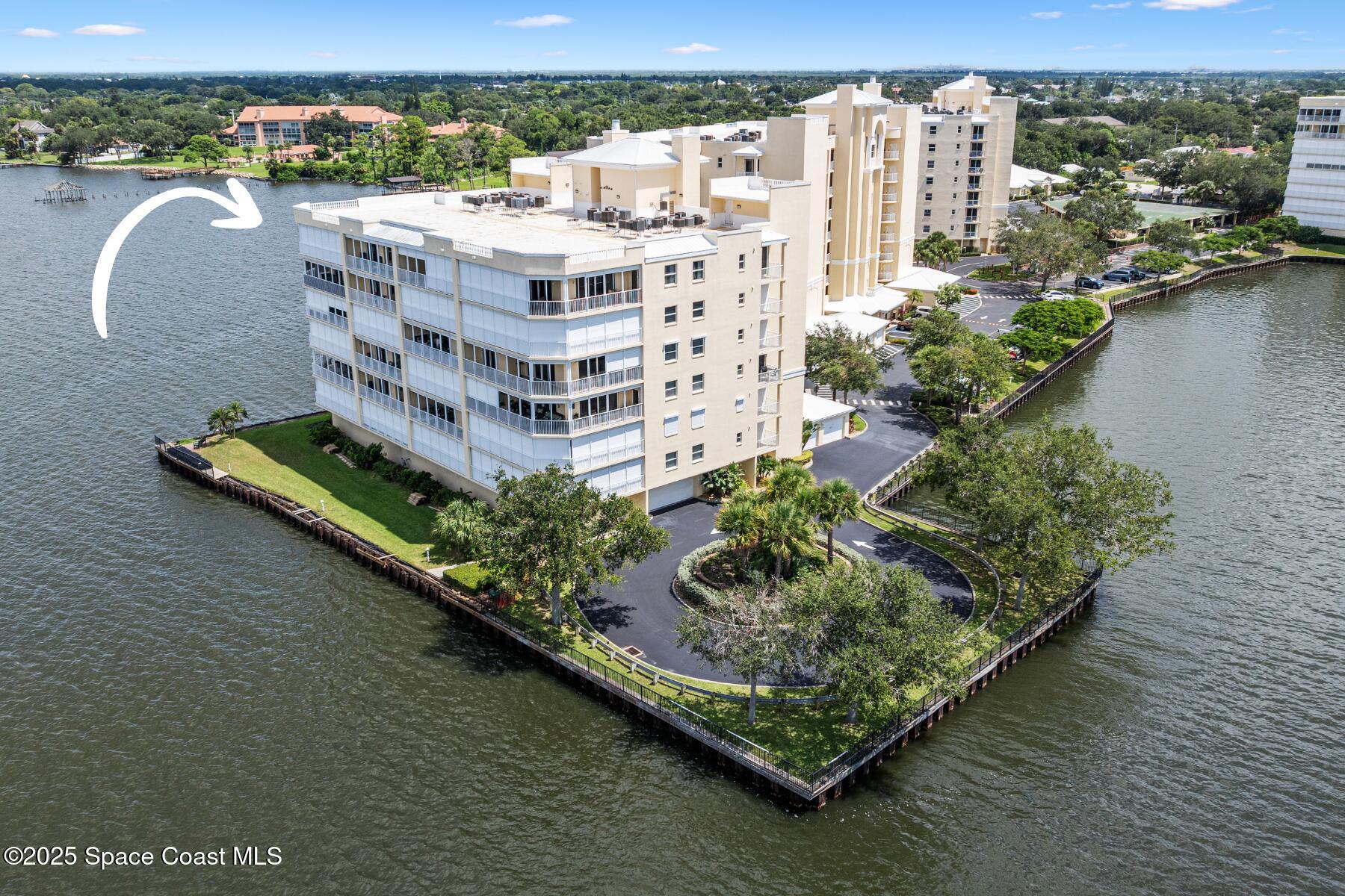 500 Sail Lane, Unit 203 Merritt Island, FL 32953 - Photo 45 of 52 an aerial view of a house with outdoor space and lake view