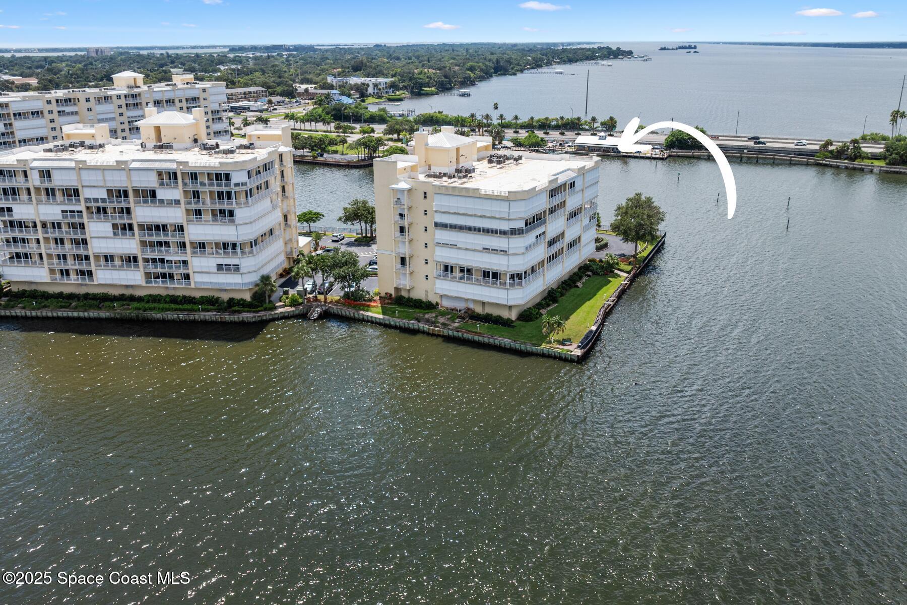 500 Sail Lane, Unit 203 Merritt Island, FL 32953 - Photo 48 of 52 aerial view of a house with a lake view