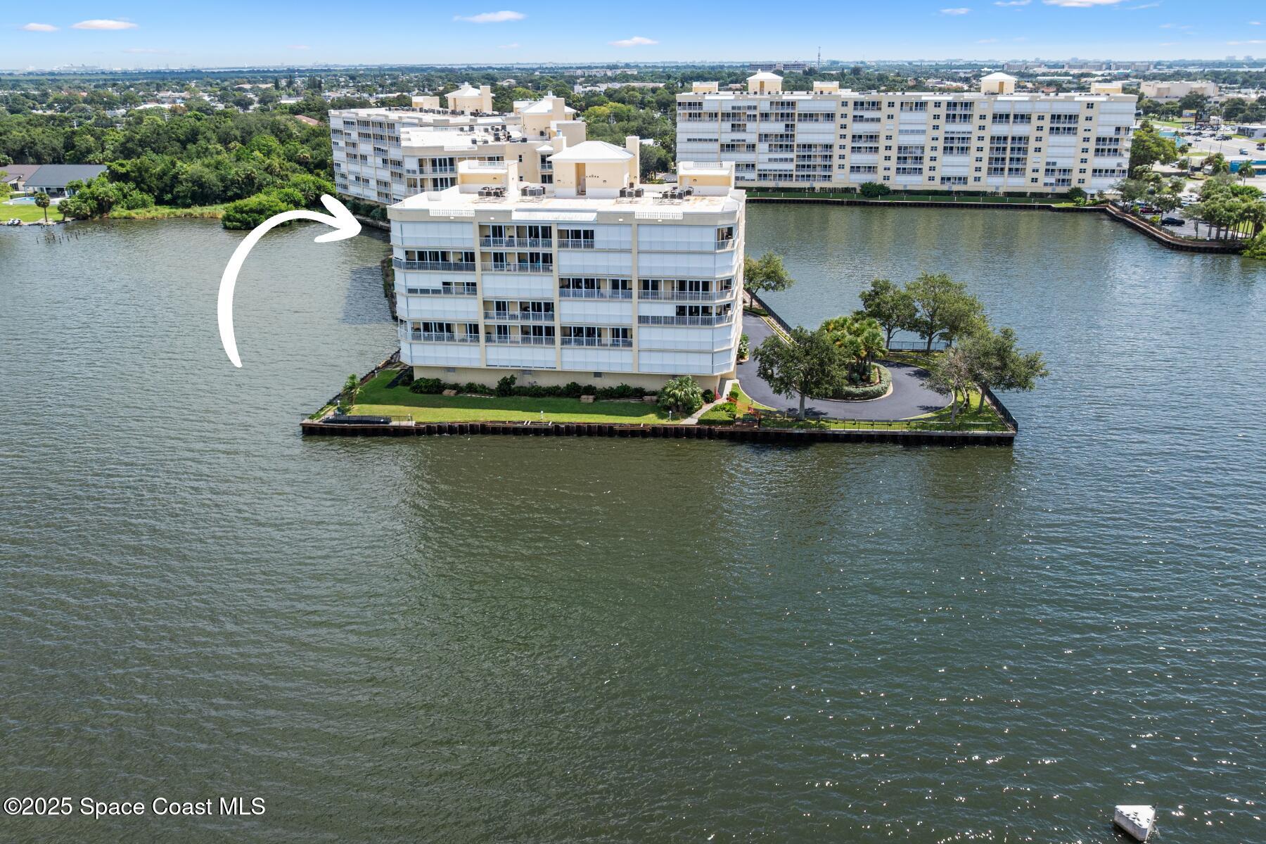 500 Sail Lane, Unit 203 Merritt Island, FL 32953 - Photo 50 of 52 an aerial view of a house with a ocean view