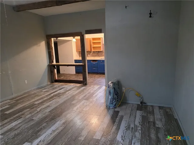 wooden floor and window in a room