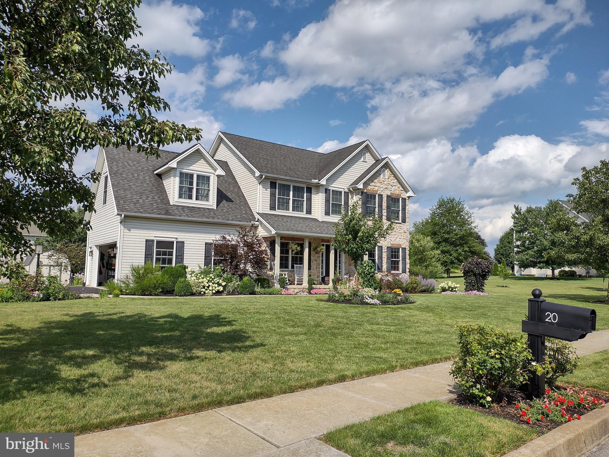 20 Netherby Lane Carlisle, PA 17015 - Photo 3 of 81 a front view of a house with a garden