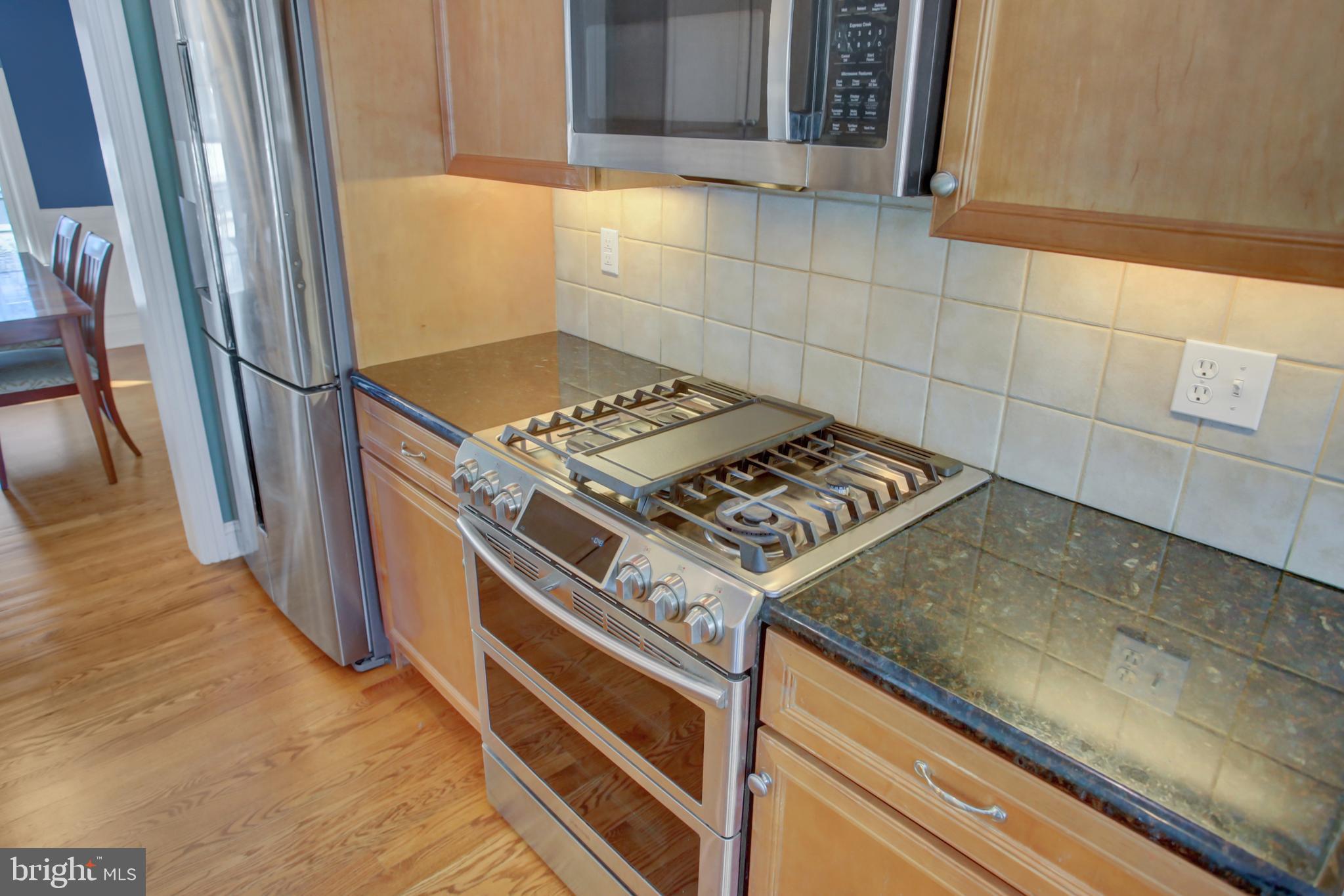 20 Netherby Lane Carlisle, PA 17015 - Photo 36 of 81 a stove top oven sitting inside of a kitchen