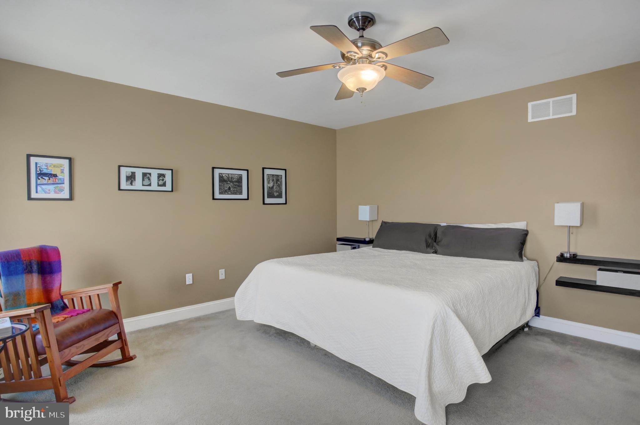 20 Netherby Lane Carlisle, PA 17015 - Photo 51 of 81 a bedroom with a bed and a chandelier