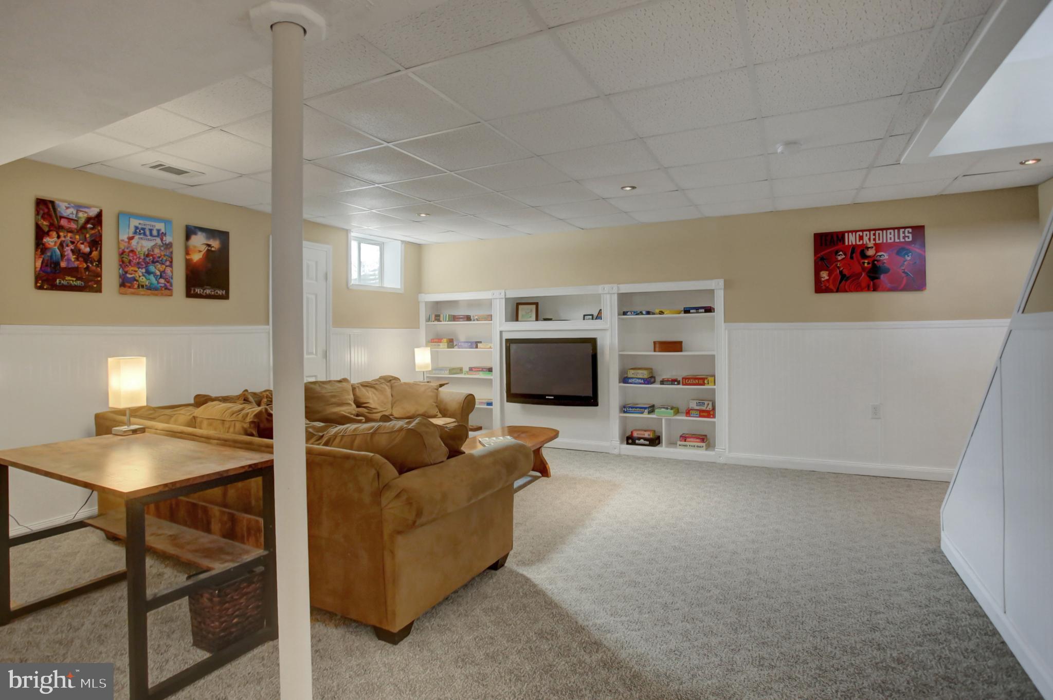 20 Netherby Lane Carlisle, PA 17015 - Photo 58 of 81 a living room with furniture and a flat screen tv
