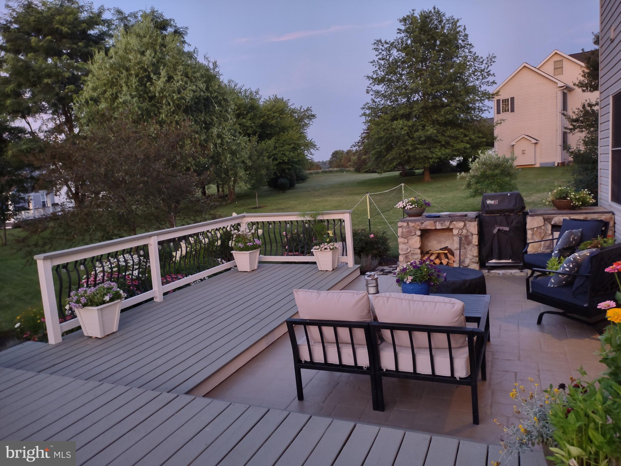 20 Netherby Lane Carlisle, PA 17015 - Photo 79 of 81 a view of a roof deck with table and chairs with wooden floor and fence