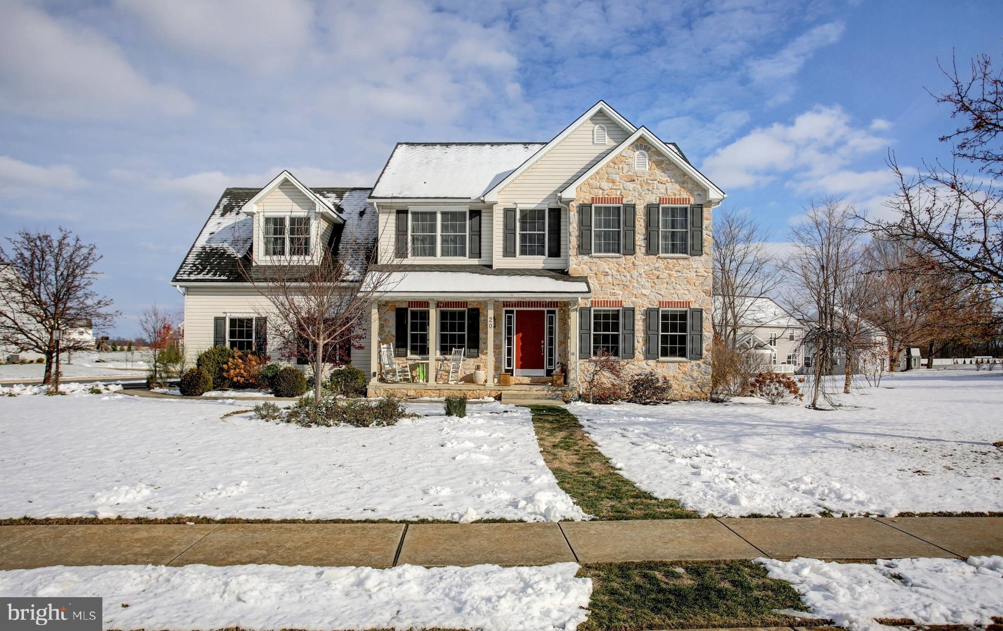 20 Netherby Lane Carlisle, PA 17015 - Photo 9 of 81 a view of a white house with a large tree in front of it