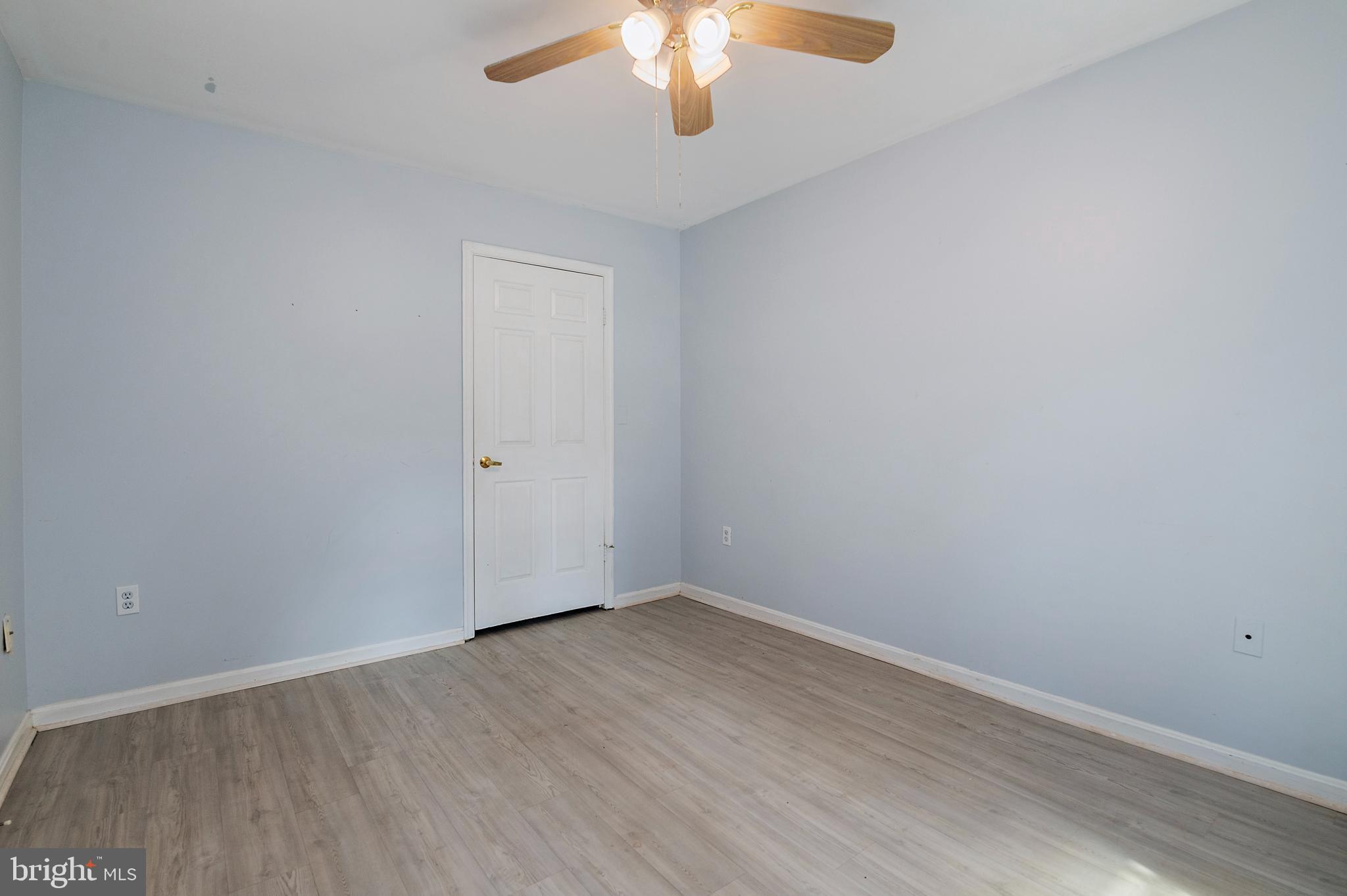 932 Riversedge Circle Annapolis, MD 21401 - Photo 17 of 42 wooden floor in an empty room with a window