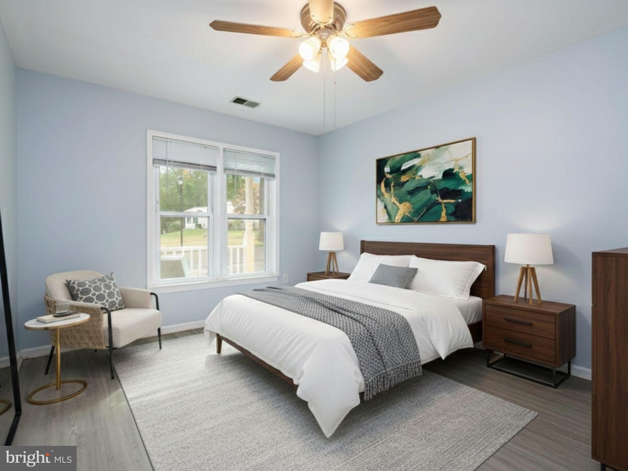 932 Riversedge Circle Annapolis, MD 21401 - Photo 19 of 42 a bedroom with a bed and a window