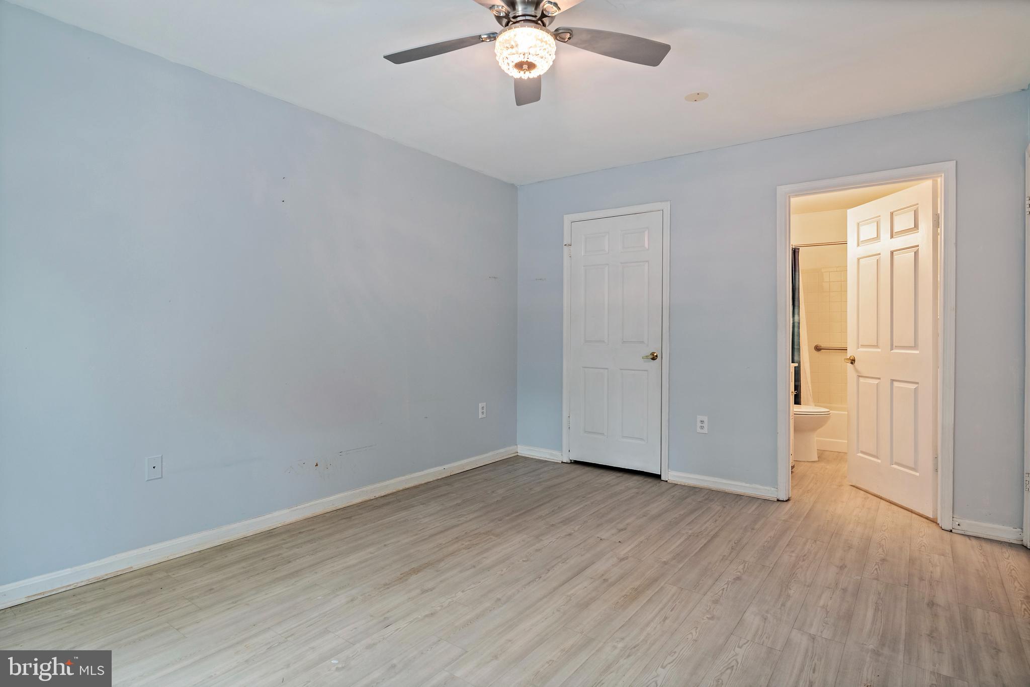 932 Riversedge Circle Annapolis, MD 21401 - Photo 21 of 42 wooden floor in an empty room with a window