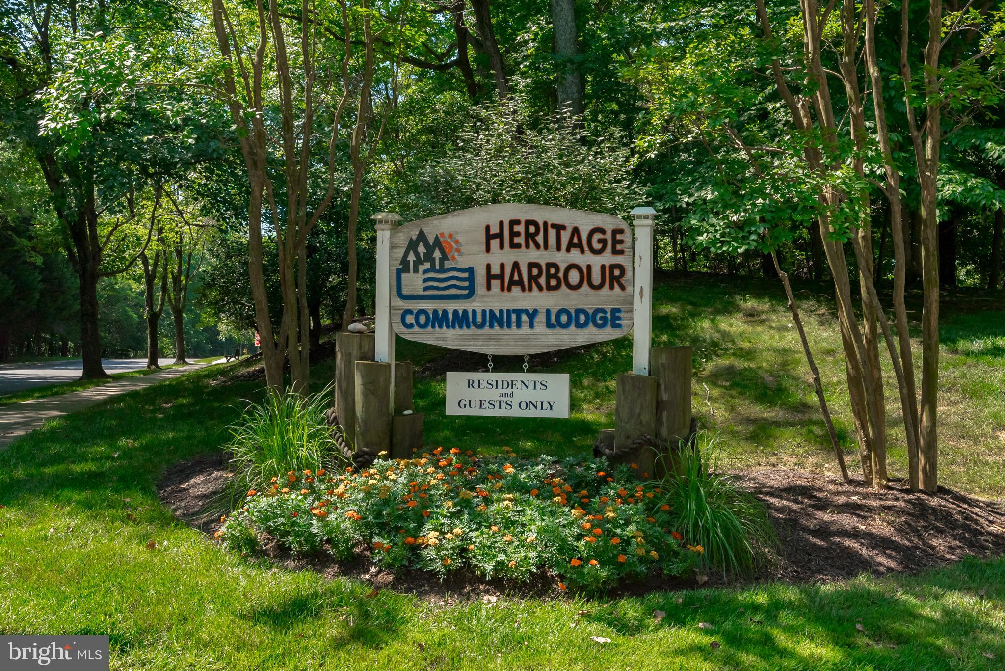 932 Riversedge Circle Annapolis, MD 21401 - Photo 31 of 42 a sign on the side of the tree