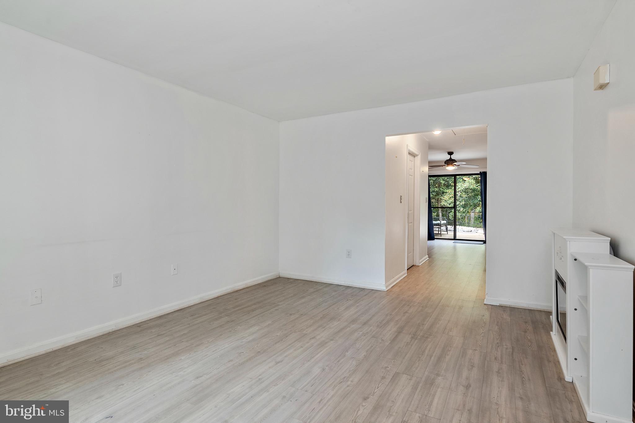 932 Riversedge Circle Annapolis, MD 21401 - Photo 8 of 42 a view of a room with wooden floor and window