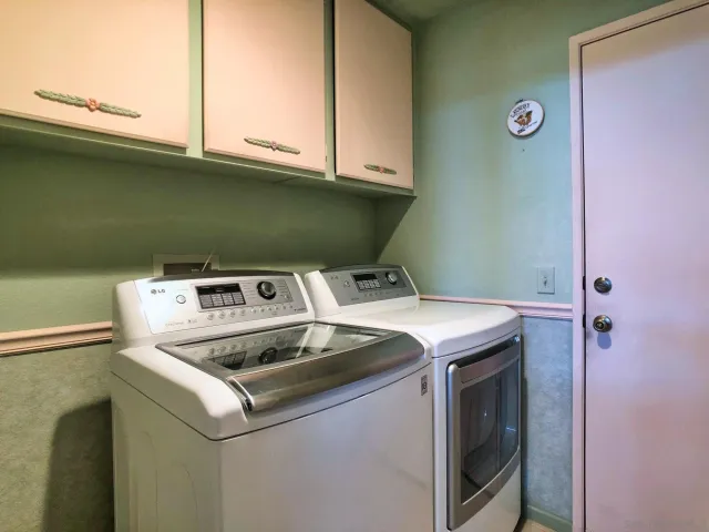 a living room with fireplace furniture and a flat screen tv