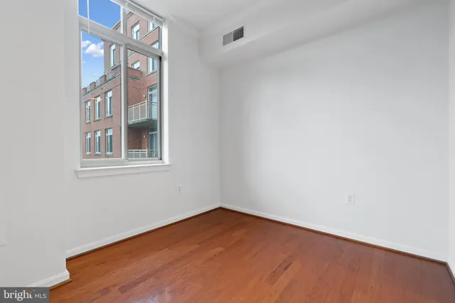 a view of empty room with windows