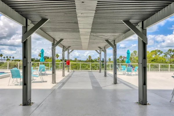 a view of a swimming pool with a terrace