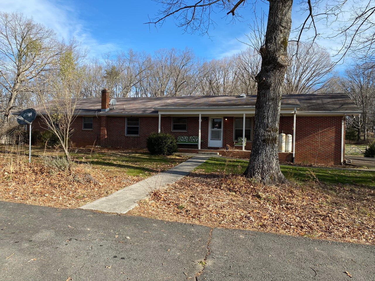 2097 Sandy Level Road Goodview, VA 24095 - Photo 2 of 43 a front view of a house with garden