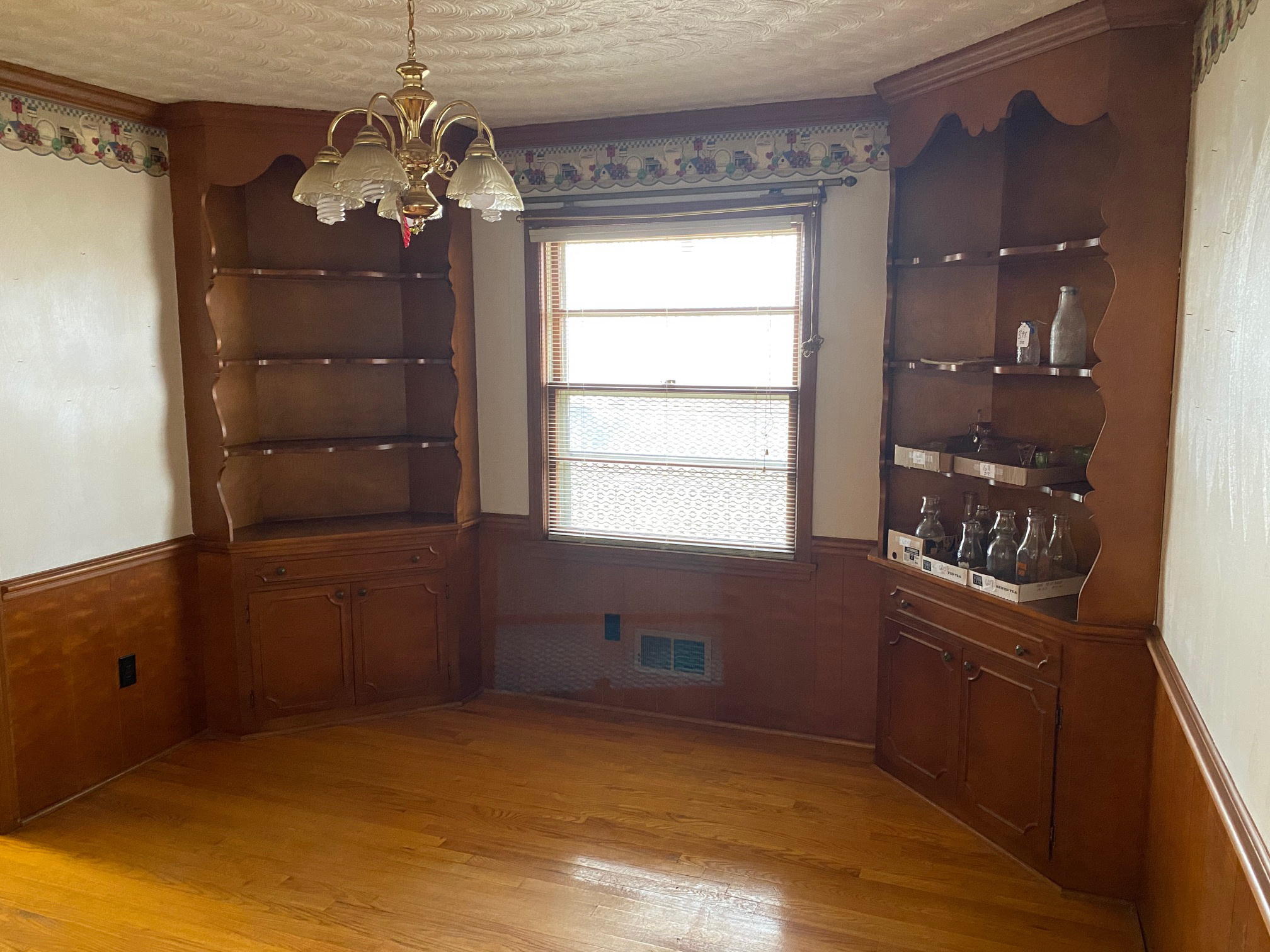 2097 Sandy Level Road Goodview, VA 24095 - Photo 11 of 43 a kitchen that has a lot of cabinets and wooden floor