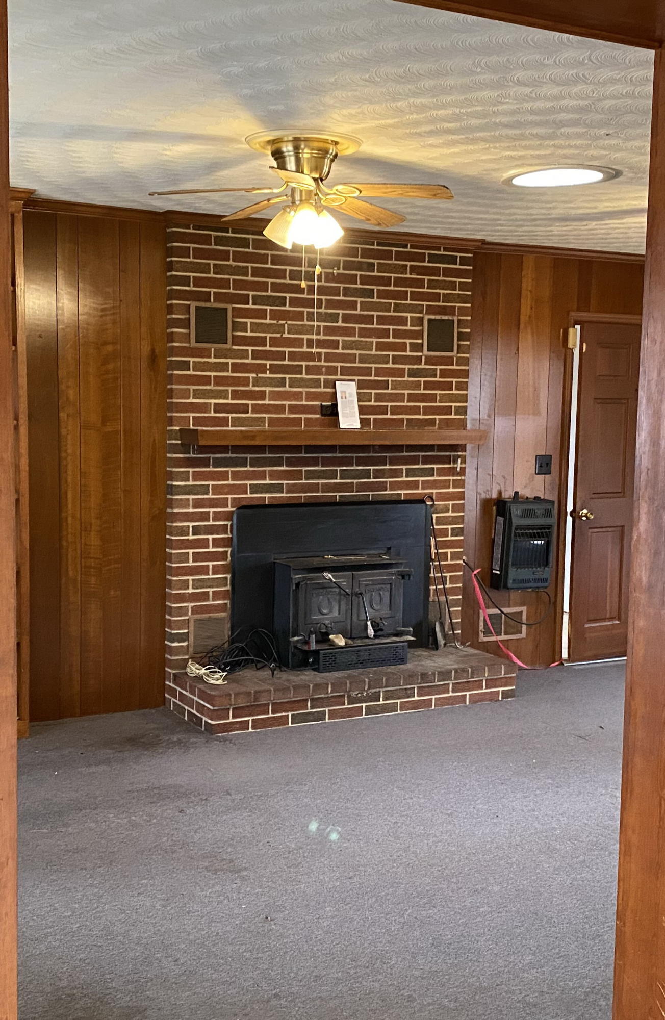 2097 Sandy Level Road Goodview, VA 24095 - Photo 19 of 43 a view of empty room with a fireplace