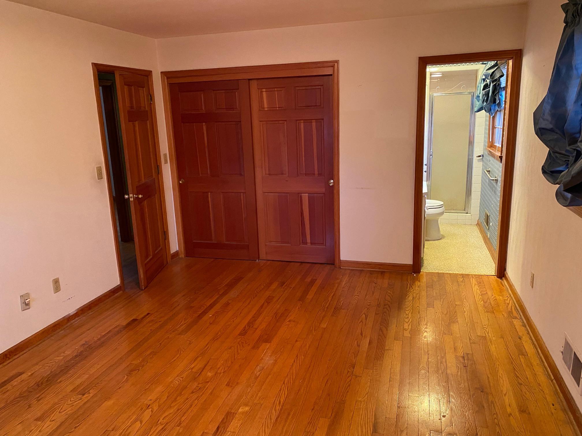 2097 Sandy Level Road Goodview, VA 24095 - Photo 4 of 43 wooden floor in an empty room