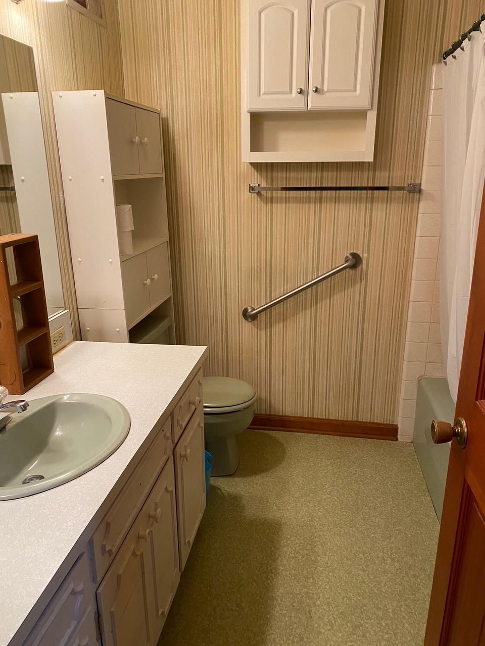 2097 Sandy Level Road Goodview, VA 24095 - Photo 6 of 43 a bathroom with a sink a toilet and shower