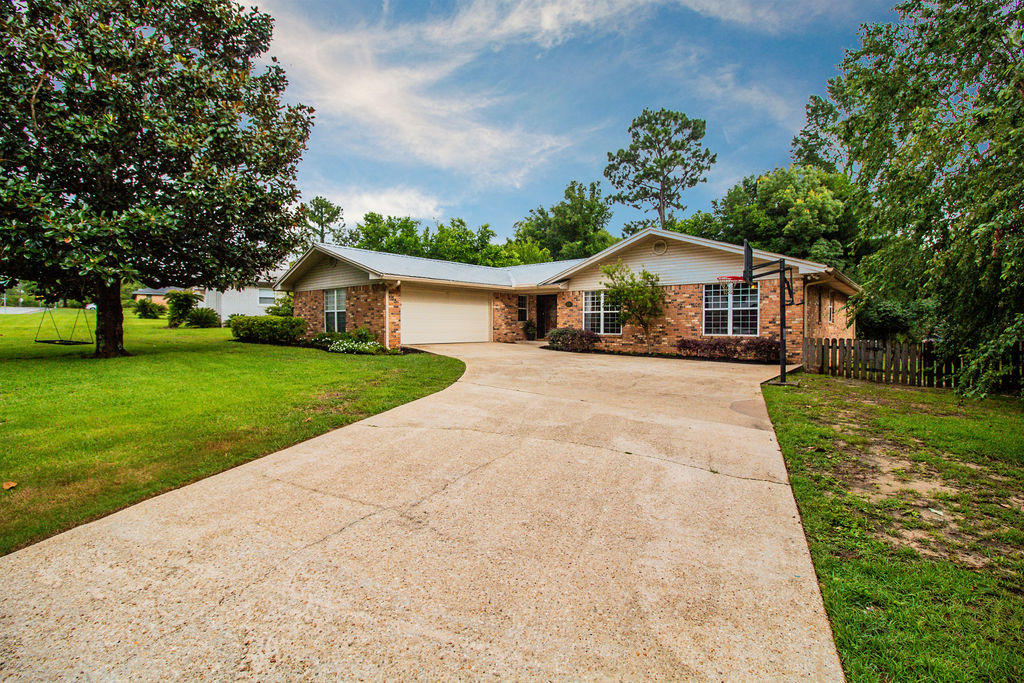 2135 Semur Road Pensacola, FL 32503 - Photo 1 of 37 a view of a house with a yard