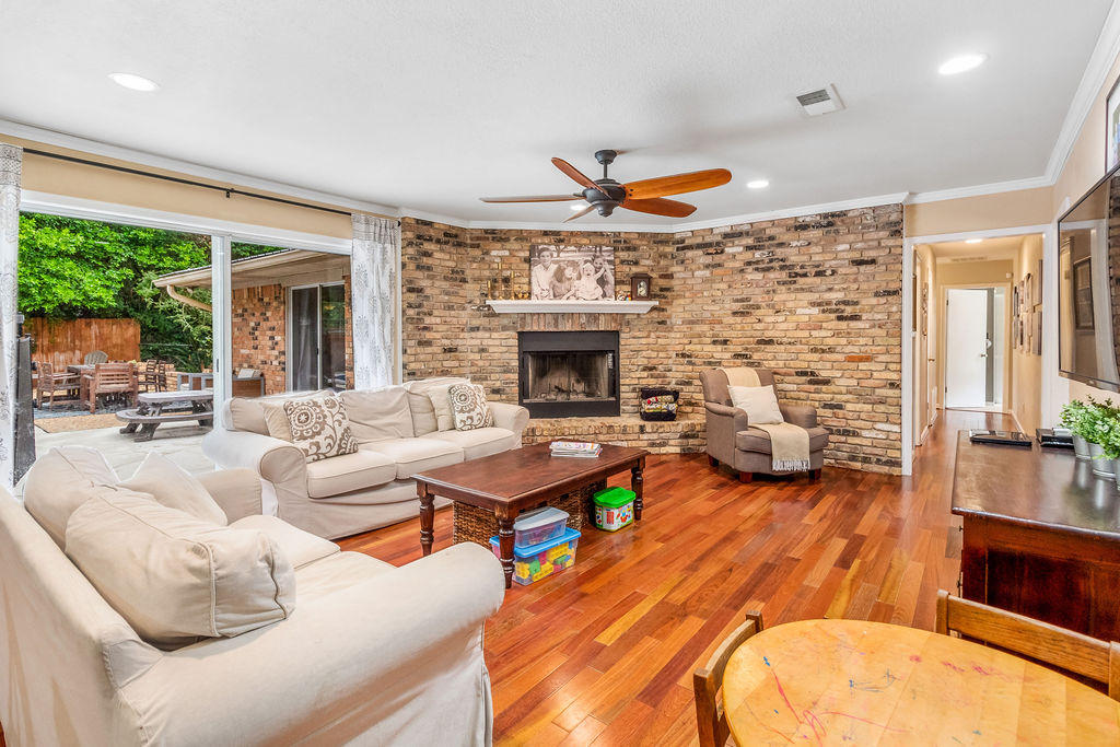 2135 Semur Road Pensacola, FL 32503 - Photo 13 of 37 a living room with furniture fireplace and a fireplace